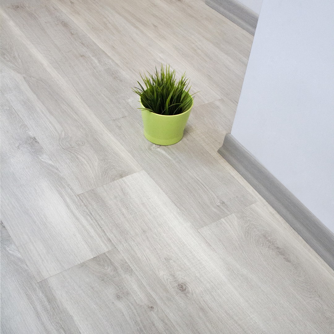 Oak light gray wood Parquet laminate flooring | Best Flooring Shop in UAE | Abu Dhabi | Gray wood floor for sale in UAE | Malaysian made